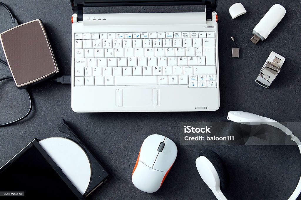 Computer peripherals & laptop accessories. Composition on stone counter